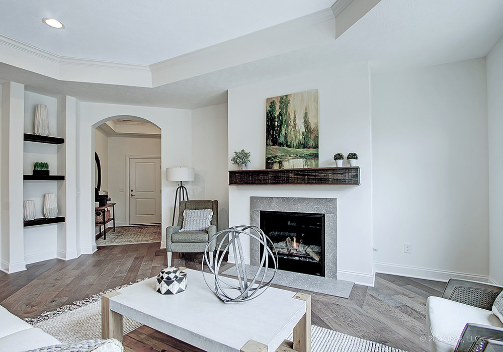 The Promenade model by New Leaf Homes showcases modern design and elegant features in a stylish residential setting.