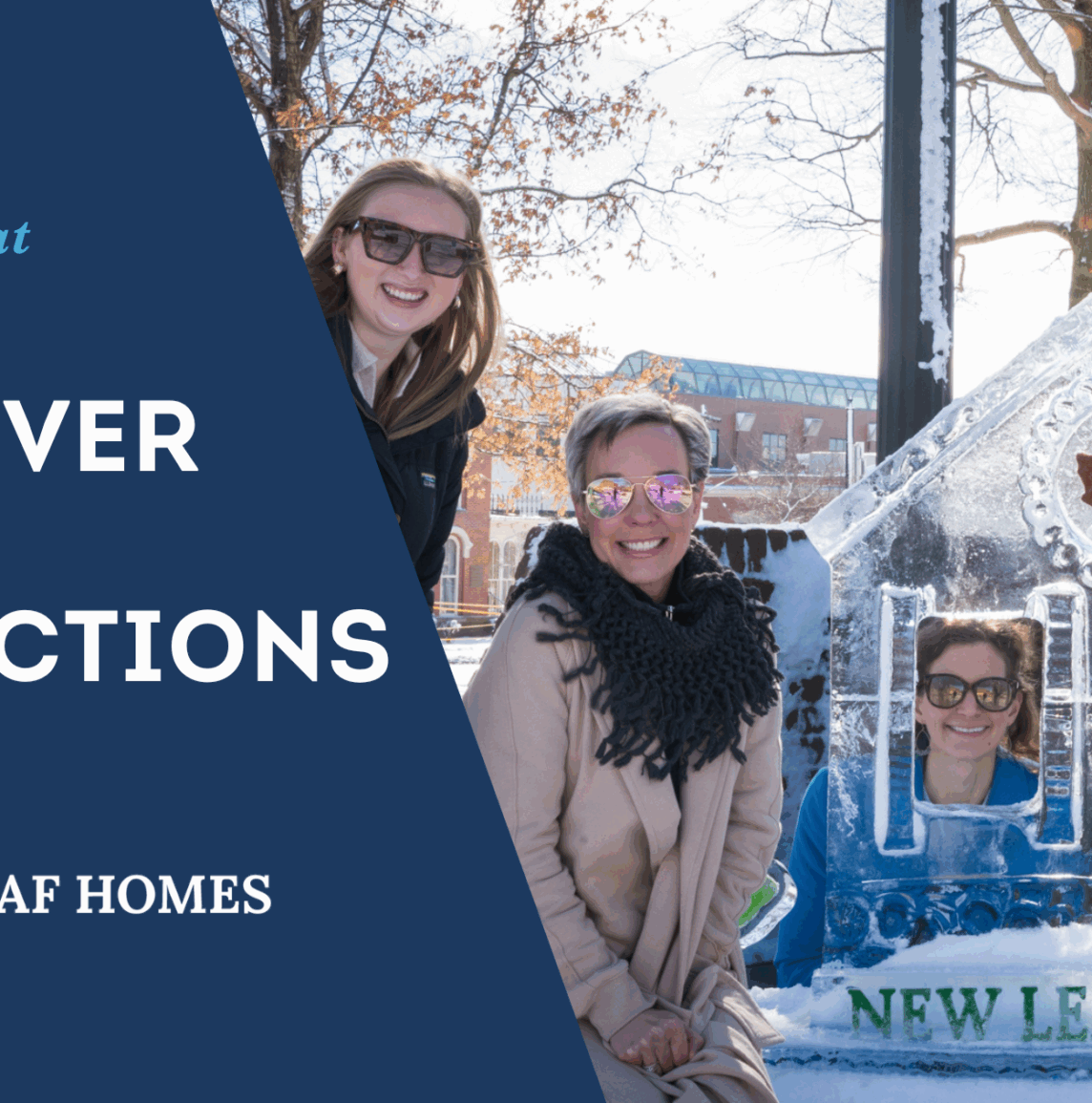 New Leaf Homes team poses at Medina Ice Festival behind an ice sculpture shaped like a house with the company logo.